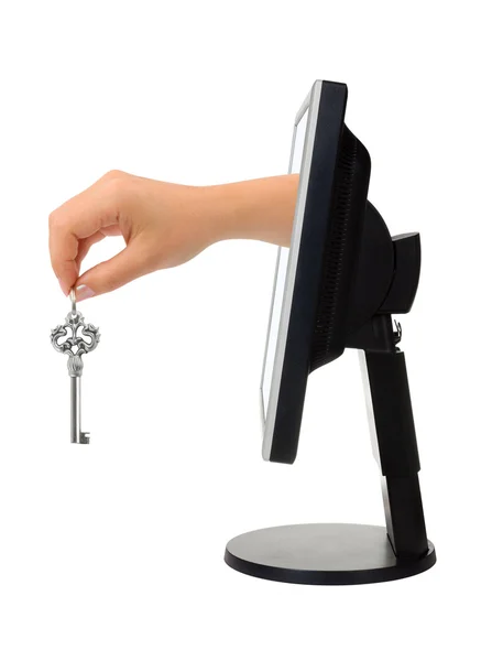 Computer screen and hand with key — Stock Photo, Image