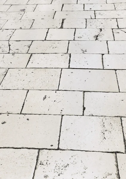 Retro betegelde vloer op straat in croatia — Stockfoto
