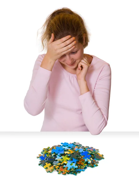 Girl and puzzle — Stock Photo, Image