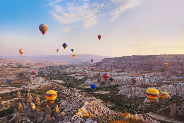 Hot air balloon flying over Cappadocia Turkey Royalty Free Stock Photos