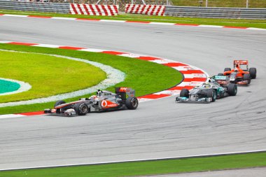 SEPANG, MALAYSIA - APRIL 10: Cars on track at race of Formula 1 clipart