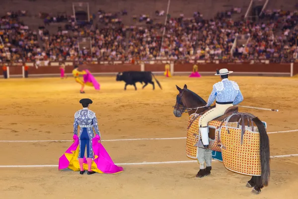 Matador and bull in bullfighting at Madrid — Stock Photo, Image