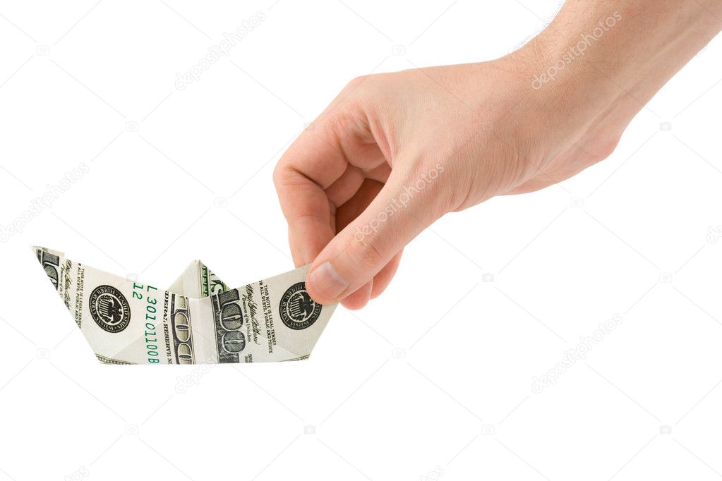 Hand with money ship