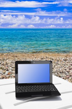 Notebook on beach clipart