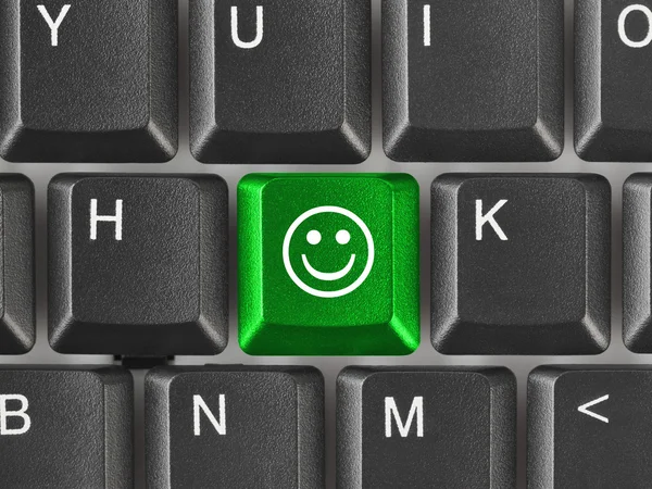 Computer keyboard with smile key — Stock Photo, Image