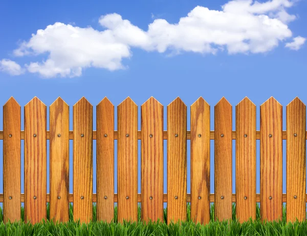 stock image Wood fence and blue sky horizon with clouds in summer day