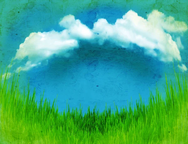 Vintage landschap met groene gras en blauwe hemel — Stockfoto