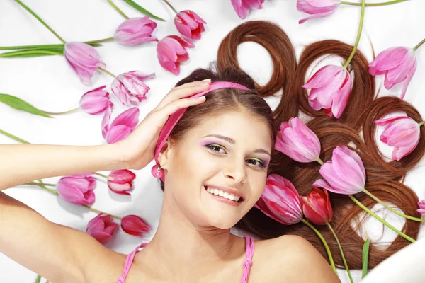 stock image Beautiful girl with tulips