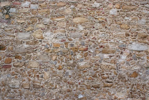 Текстура древней каменной стены — стоковое фото