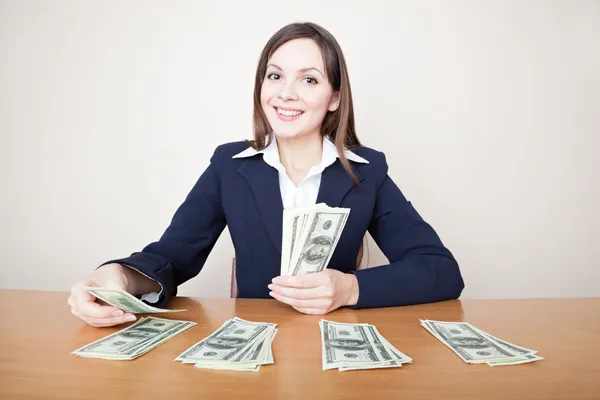 Mujer de negocios con dinero —  Fotos de Stock