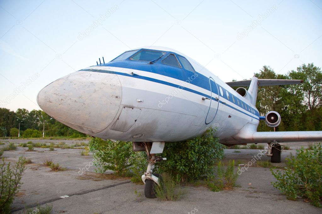Old russian airplane is on the disused airfield