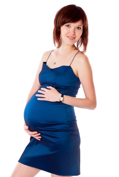 Una mujer embarazada sonriente — Foto de Stock