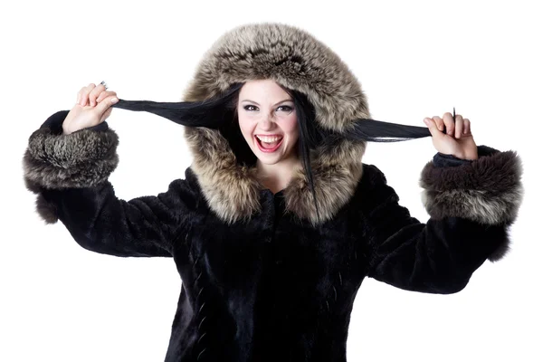 A beautiful woman in a fur-coat — Stock Photo, Image