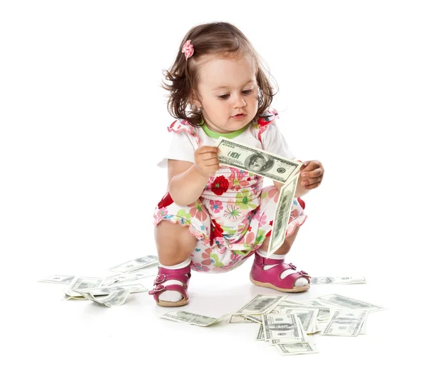 Une petite fille avec de l'argent — Photo