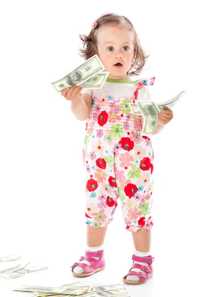 En liten flicka med pengar — Stockfoto