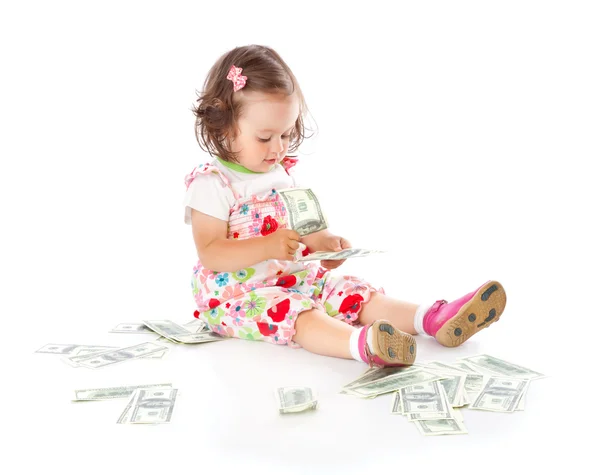 Para ile küçük bir kız — Stok fotoğraf