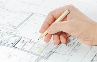 Hand and architectural project clipart