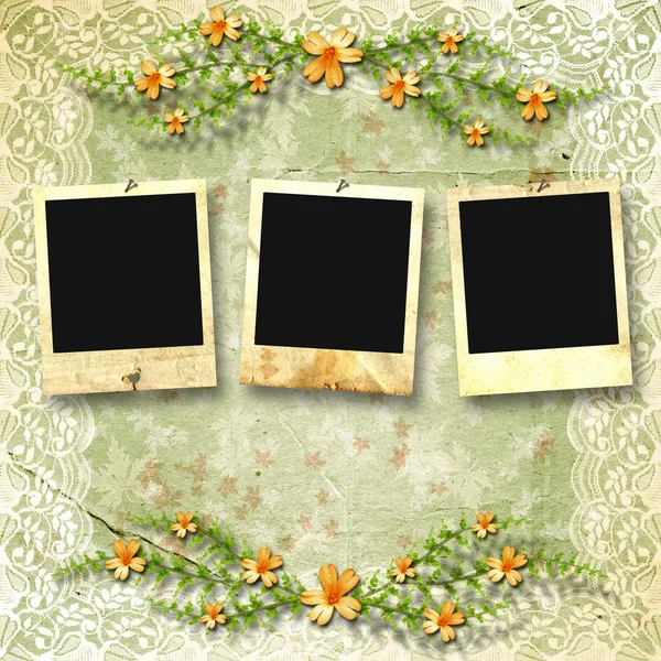Old photoframes are hanging on the vintage background. Royalty Free Stock Images