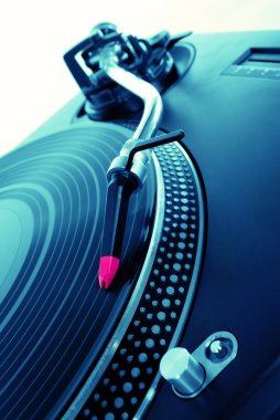 Turntable playing vinyl record clipart