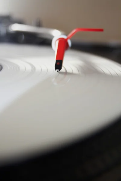 Professional turntable playing vinyl record — Stock Photo, Image