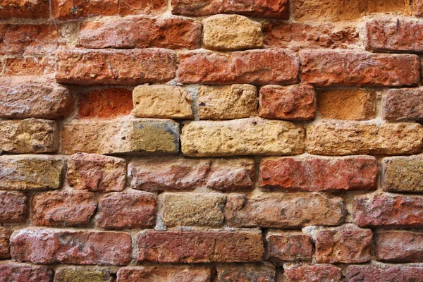 Velho rachado tijolos vermelhos textura — Fotografia de Stock