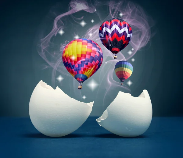 Balloons take off from the broken eggs. — Stock Photo, Image