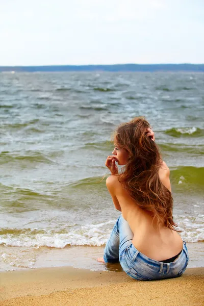 Topless girl on beach