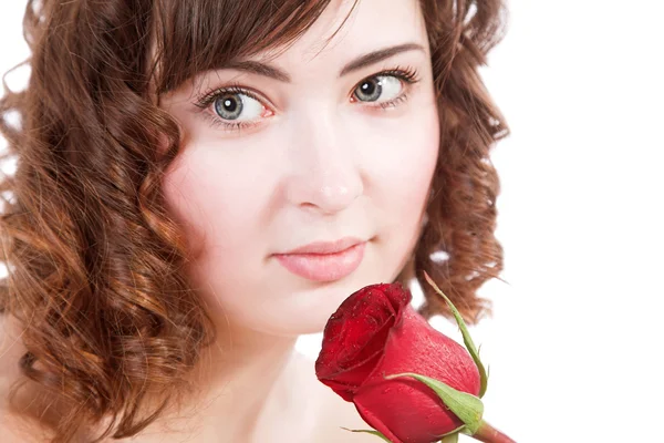 Женщина держит розу — стоковое фото