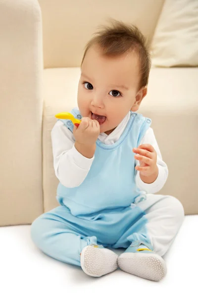 Baby with spoon — Stock Photo, Image