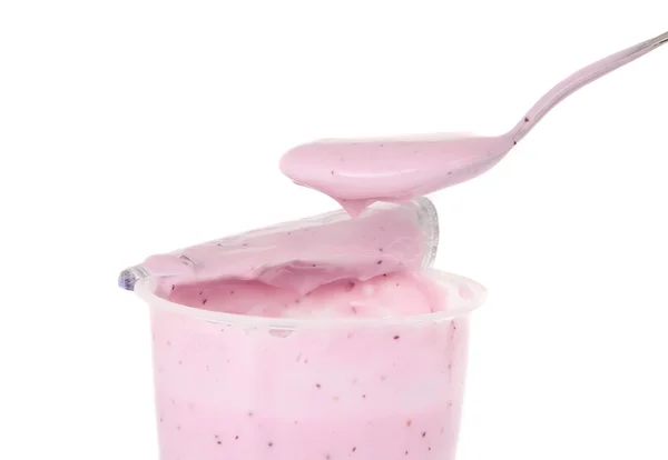 Yogurt alla frutta con un cucchiaio — Foto Stock