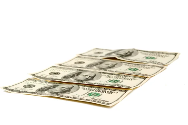 Stu dolarowe na białym tle — Zdjęcie stockowe