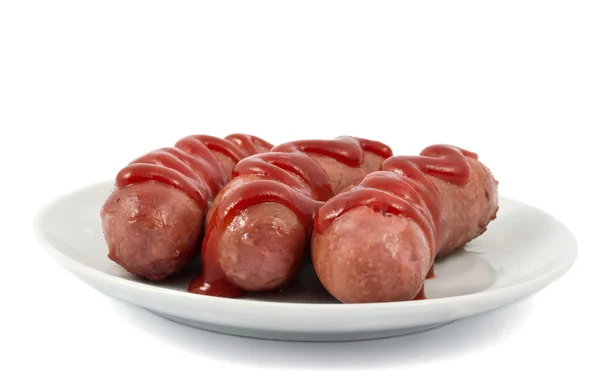 Sausages on a plate Stock Picture