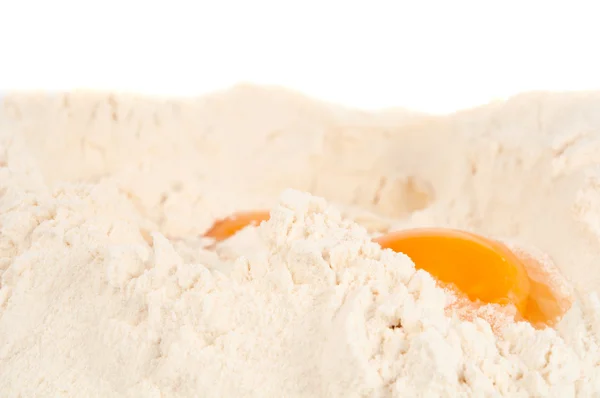 stock image Eggs in the flour