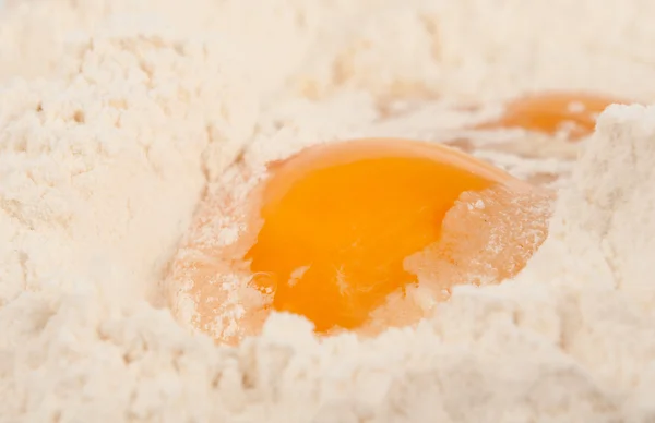 stock image Eggs in the flour