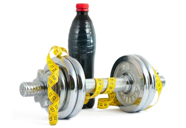 Dumbbell with a measuring tape — Stock Photo, Image