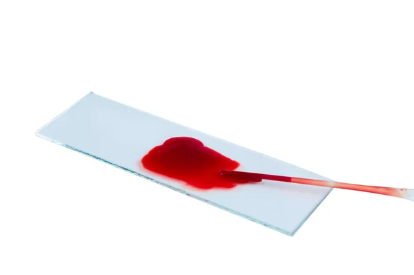 Gota de sangre en el vidrio aislado — Foto de Stock