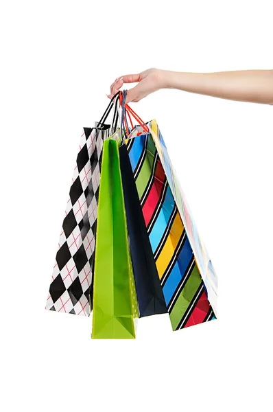 Woman hand with shopping bags — Stock Photo, Image