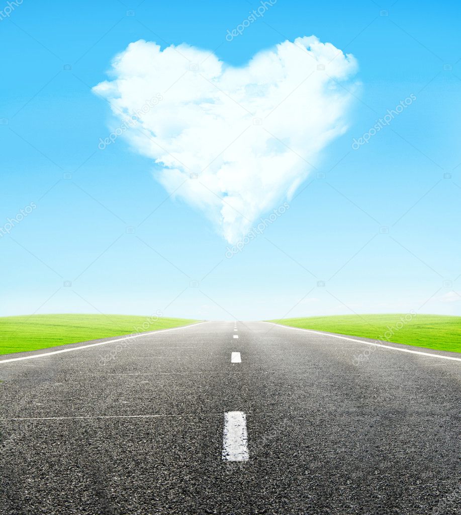 Road and cloudy heart in sky