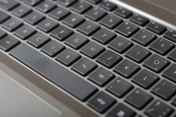 Close-up shot van zwarte laptop toetsenbord — Stockfoto