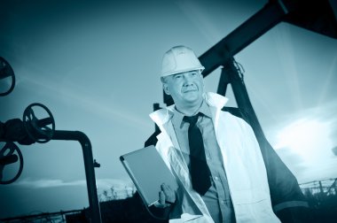 Worker in an Oil field clipart