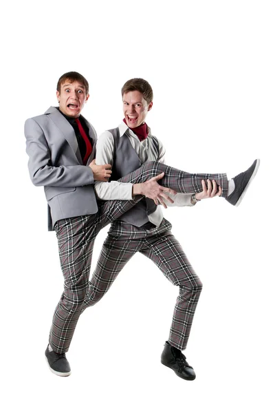 Estudantes engraçados em calças quadriculadas — Fotografia de Stock