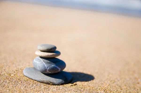 stock image Stones stacked up on beach