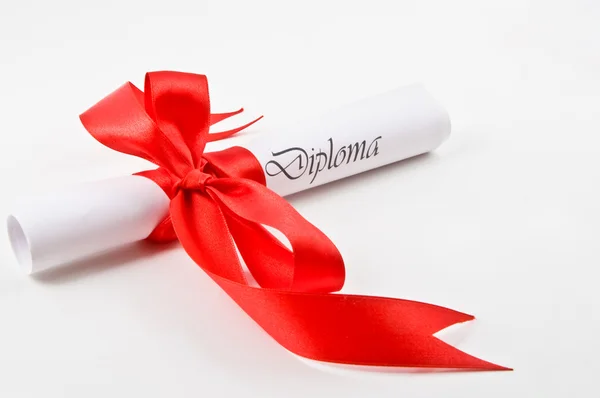 Diploma met rood lint — Stockfoto