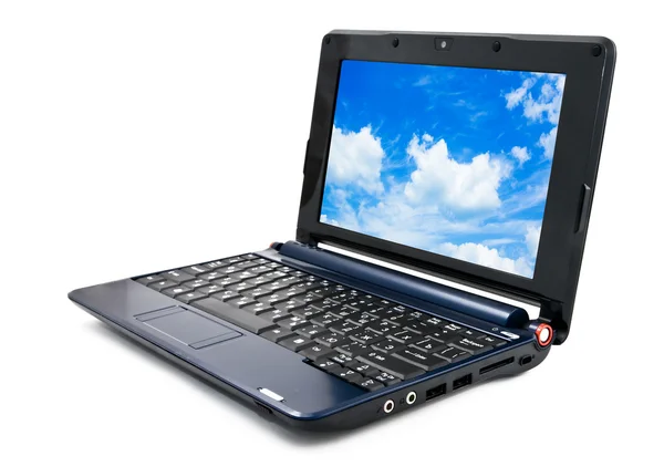 Modern and stylish laptop computer with blue cloudy sky wallpape — Stock Photo, Image