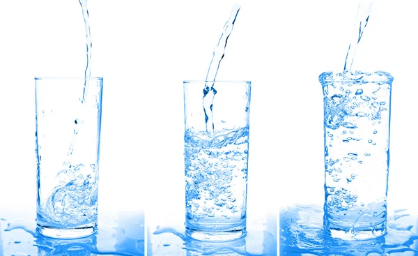 stock image Glass of water being poured