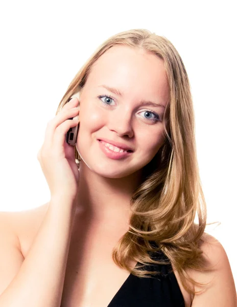 Красивая девушка и телефон на белом — стоковое фото
