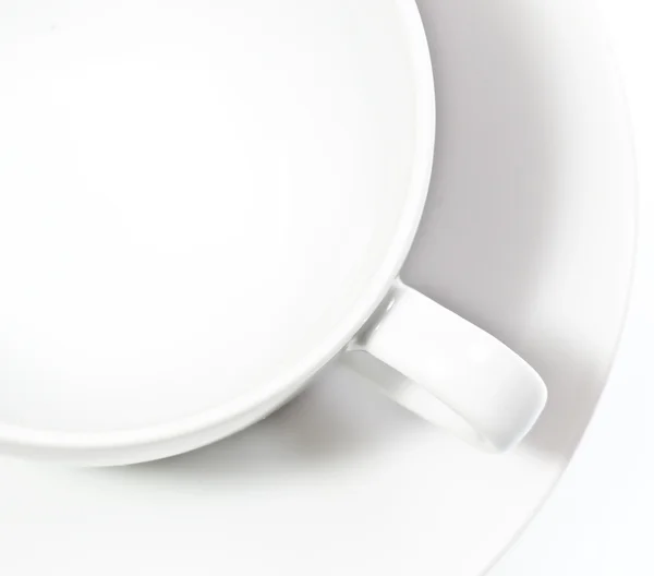 白で隔離される白い空のカップ. — ストック写真