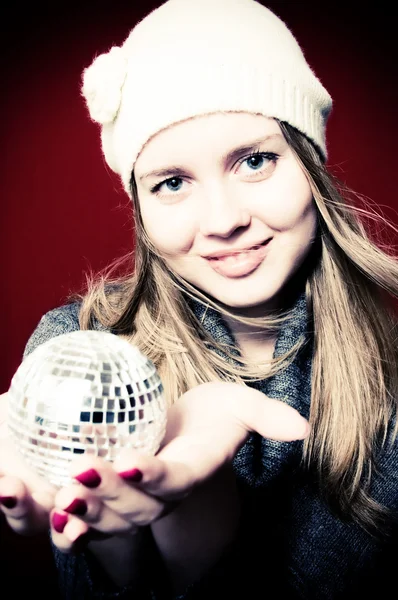 Portrait of beautiful blond young woman and christmas ball on — Stock Photo, Image