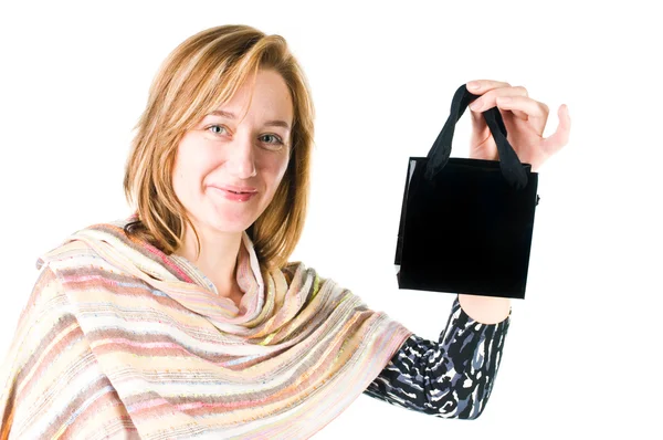 Happy young woman with shopping bag — Stock Photo, Image