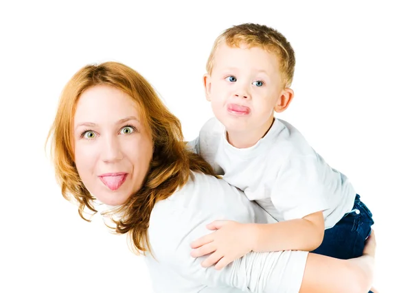 女人和儿子伸出舌头 — 图库照片